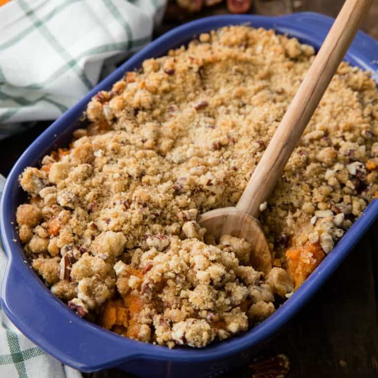 Easy Sweet Potato Casserole has creamy, spiced sweet potatoes topped with a pecan brown sugar streusel. It's the perfect side dish for any holiday meal!