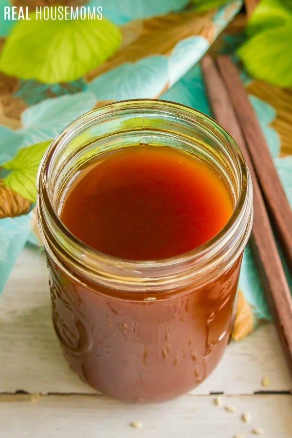 looking down into a jar of sweet and sour sauce