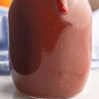 jar of sweet and tangy barbecue sauce with recipe name at bottom