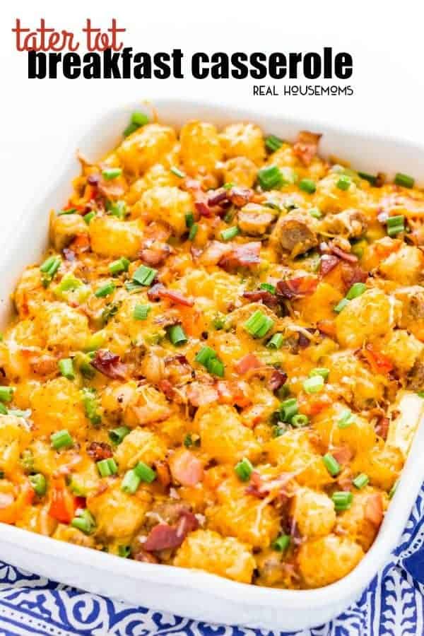 Tater Tot Breakfast Casserole in a baking dish topped with green onion and ready to be served