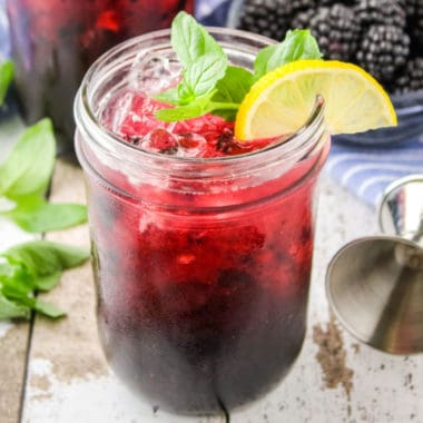 square image of tequila blackberry hard lemonade in a glass