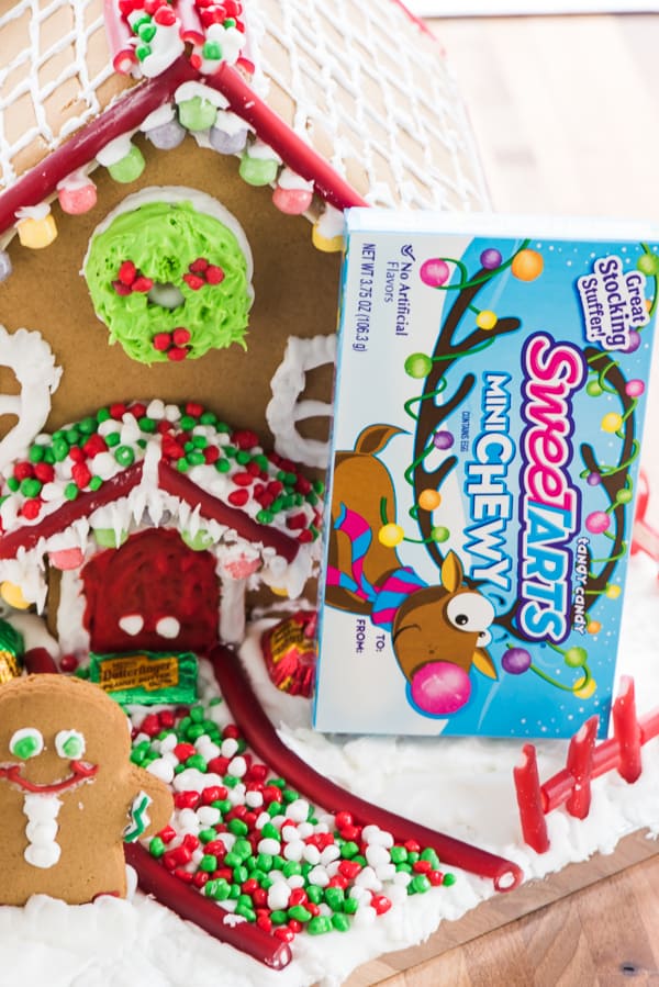 This is the BEST Gingerbread Icing! It helps to stick everything together and holds it just like glue! You'll make the prettiest gingerbread houses with this glue in your hand!