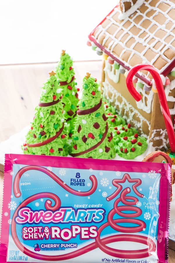 This is the BEST Gingerbread Icing! It helps to stick everything together and holds it just like glue! You'll make the prettiest gingerbread houses with this glue in your hand!