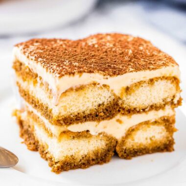 Learn how to make traditional Italian Tiramisu. With layers of creamy filling & coffee soaked ladyfingers - this tiramisu recipe is easier than you think!