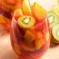 Tropical Moscato Sangria is so easy to make and a real crowd-pleaser. The perfect party drink! You mix it up the day before & no one has to play bartender!