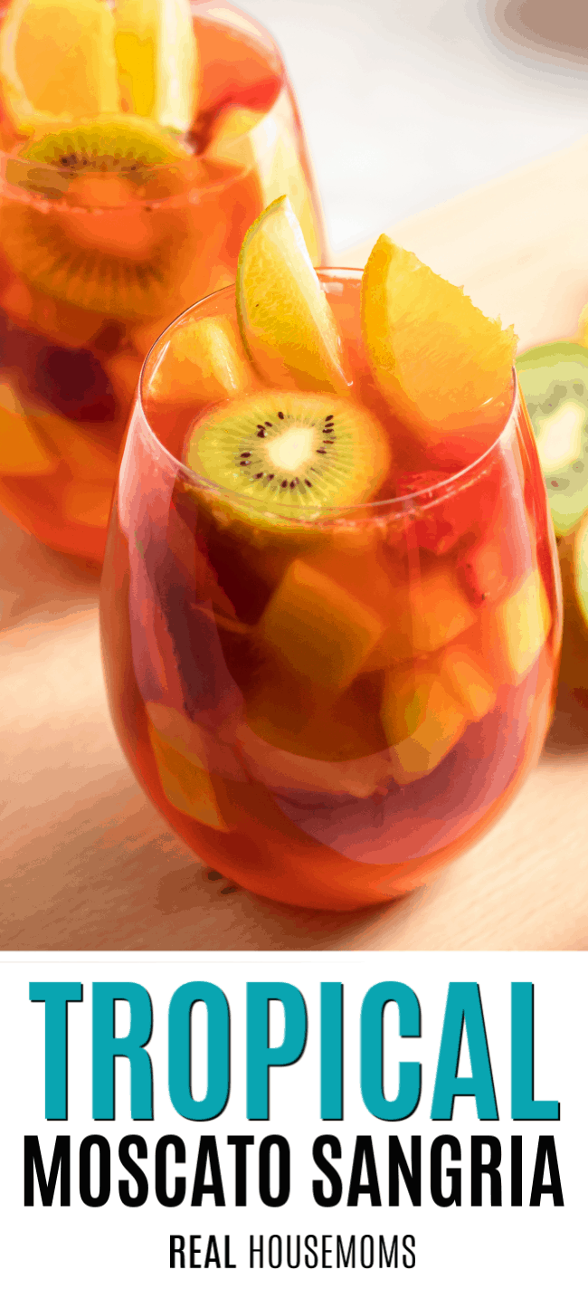 glass of tropical moscato sangria with fresh fruit