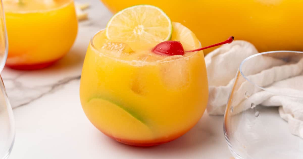 https://realhousemoms.com/wp-content/uploads/Tropical-Party-Punch-Recipe-FB-LINK.jpg