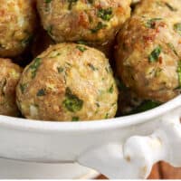 turkey meatballs piled in a bowl with recipe name at the bottom