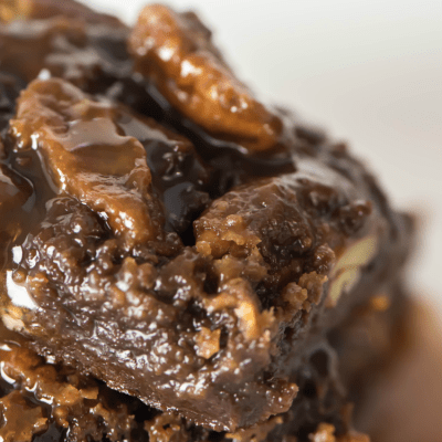 Ultimate Turtle Brownies fudgy brownies with 2 kinds of caramel sauce and pecans! This is the ultimate and it's such an easy dessert recipe!