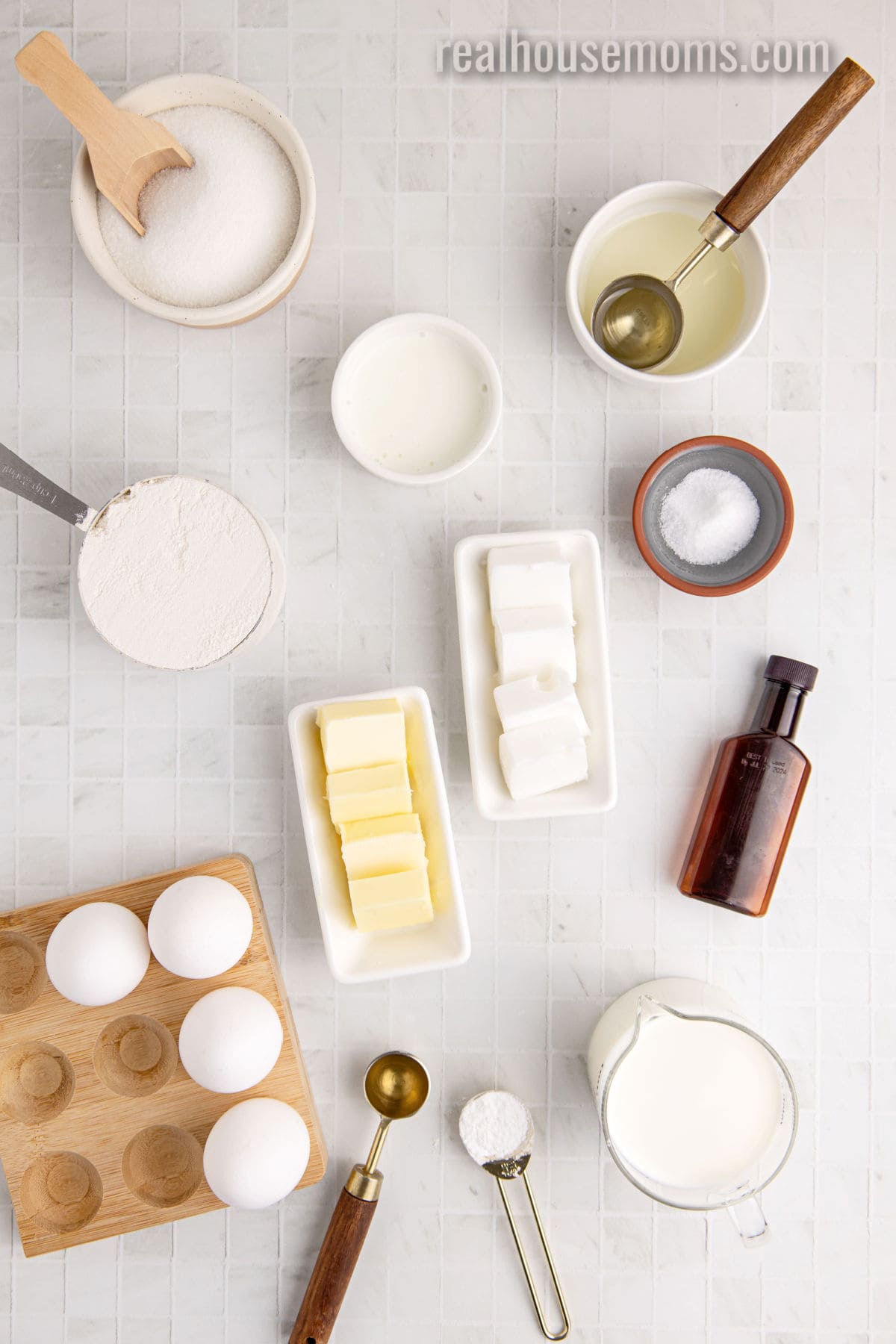 ingredients to make vanilla swiss roll laid out on a counter