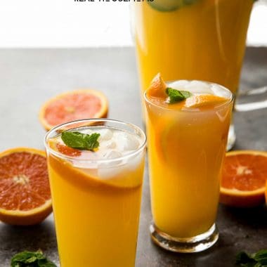 This Virgin Mango Orange Mojito is a twist on the traditional cocktail that's alcohol-free, but you could definitely add rum! It is delicious, easy to make, and so refreshing!