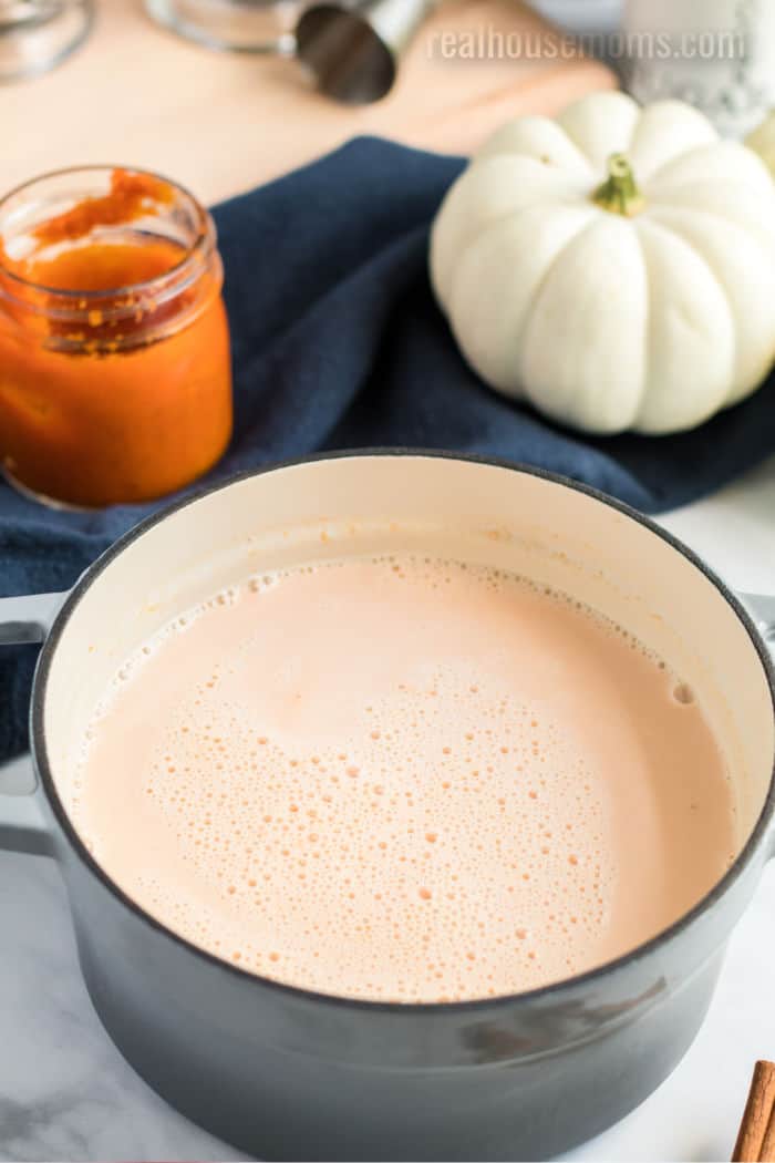 pumpkin spice cocktail in a pot after cooking