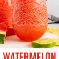 watermelon mosacto wine slushie in a wineglass with a watermelon slice with recipe name at the bottom