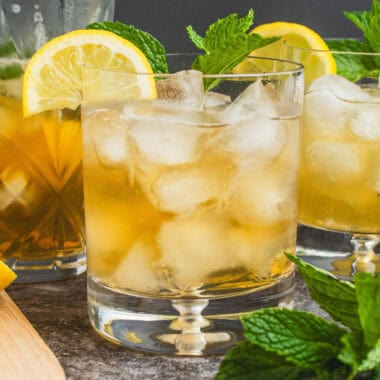 square image of whiskey sour with garnish on top