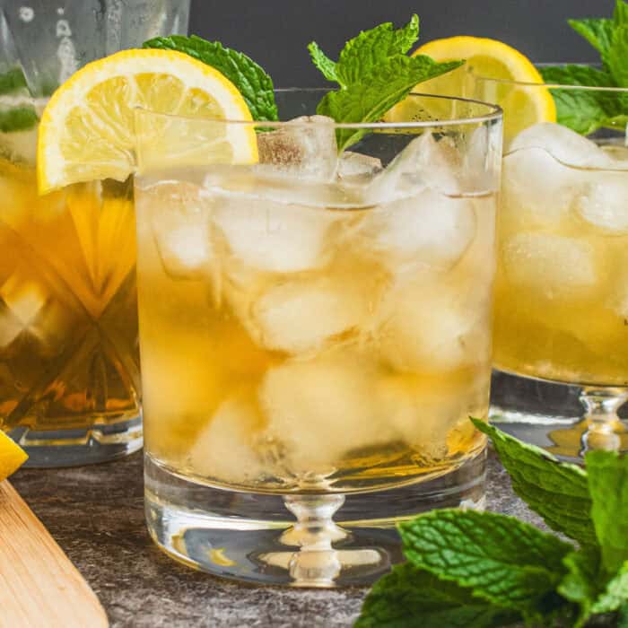 square image of whiskey sour with garnish on top