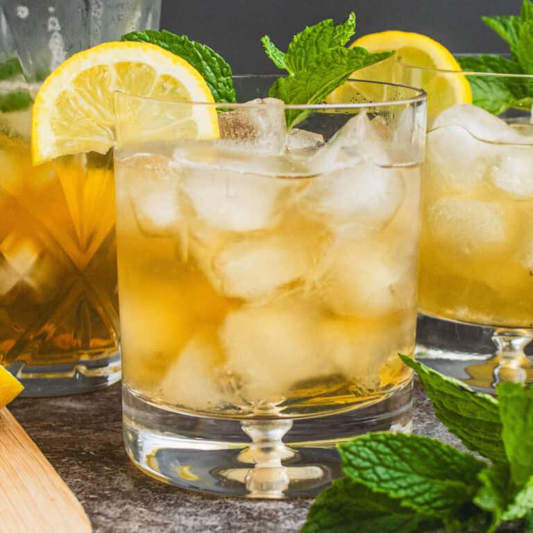 square image of whiskey sour with garnish on top