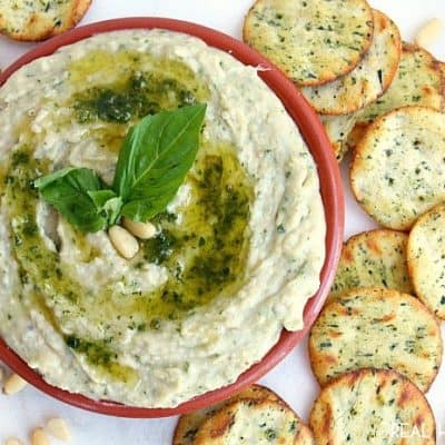 Creamy WHITE BEAN HUMMUS is made with fresh basil for a light summer flavor!