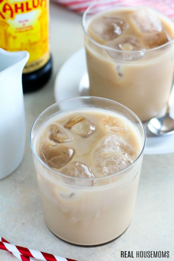 white russians with a pitcher of cream and bottle of kahlua