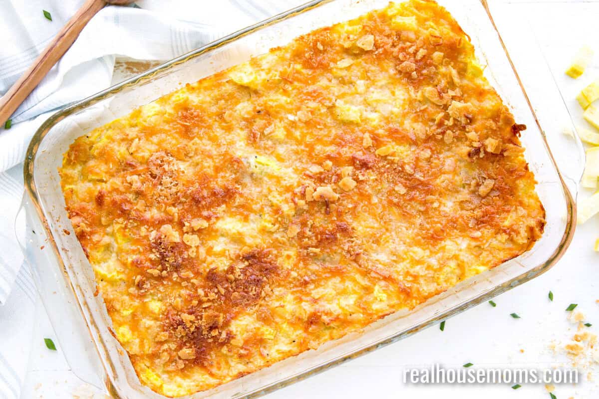 looking down a glass baking dish of yellow squash casserole
