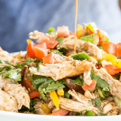This BALSAMIC TOMATO CHICKEN SALAD is packed with simple fresh ingredients and takes less than 30 minutes to make! The perfect side for that summer backyard barbecue party!