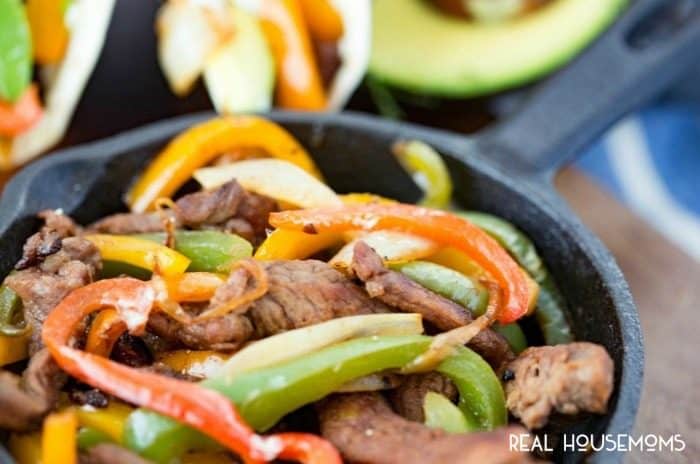 These flavorful BEEF FAJITAS are tender beef marinated in a delicious sauce, and cooked with peppers and onions for a fantastic and delicious meal!