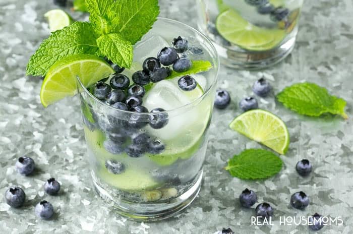 These BLUEBERRY MOJITOS are a light and refreshing summer drink that are so easy to put together - perfect for any party or casual gathering!