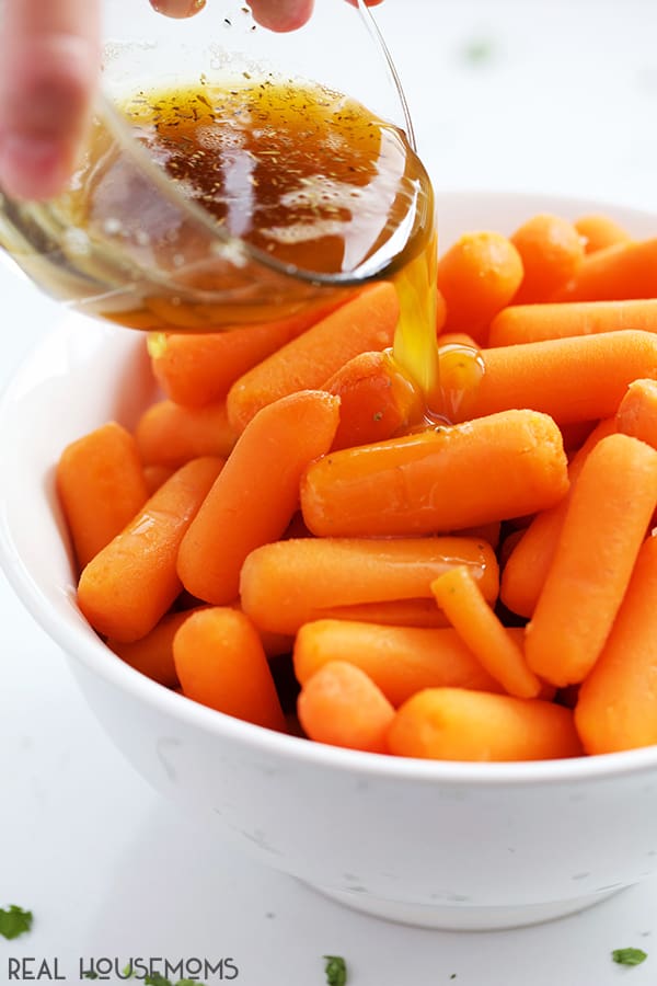 Tender baby carrots tossed in a rich brown butter & garlic herb sauce make for a simple, quick, and delicious side dish. These Brown Butter Carrots go with almost all your favorite meals!