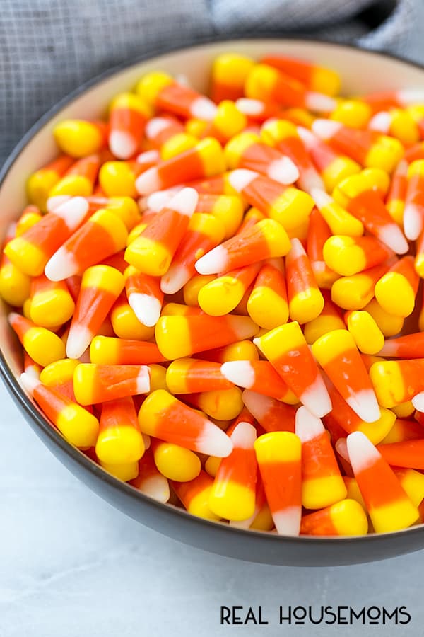 These CANDY CORN JELLO CUPS are an easy make-ahead treat that's perfect for Halloween parties or as a special fall snack!