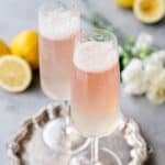 This Champagne Lemonade is the perfect light cocktail for your holiday parties! Serve it up at brunch, bridal showers, or New Year's Eve! It's easy to make too!