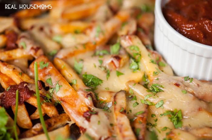 Cheesy Chipotle Fries smothered in a super spicy chipotle pepper sauce and melted Monterey Jack cheese make for a great finger food appetizer!