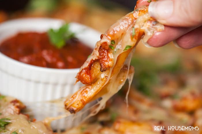 Cheesy Chipotle Fries smothered in a super spicy chipotle pepper sauce and melted Monterey Jack cheese make for a great finger food appetizer!