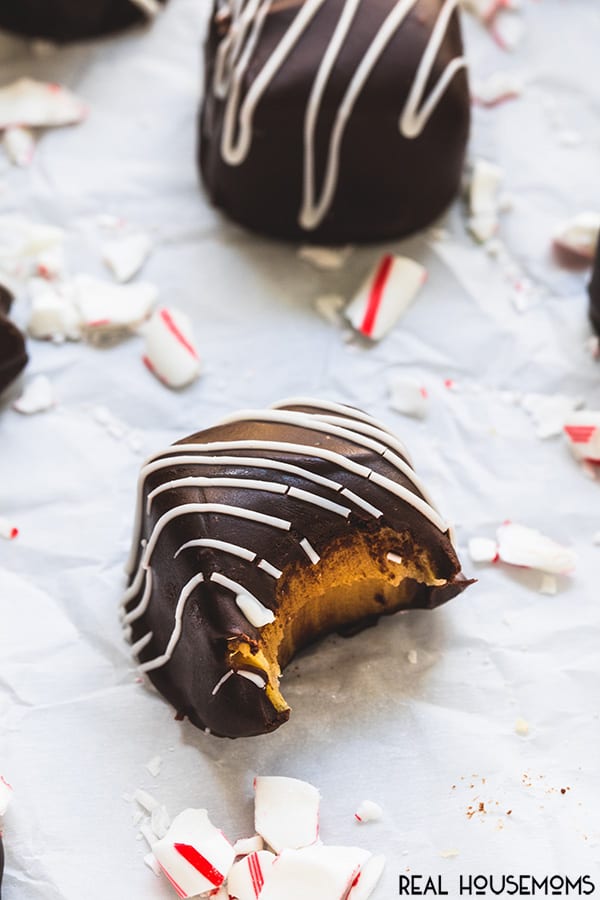 Chocolate Covered Caramel with a bite taken out to show the center
