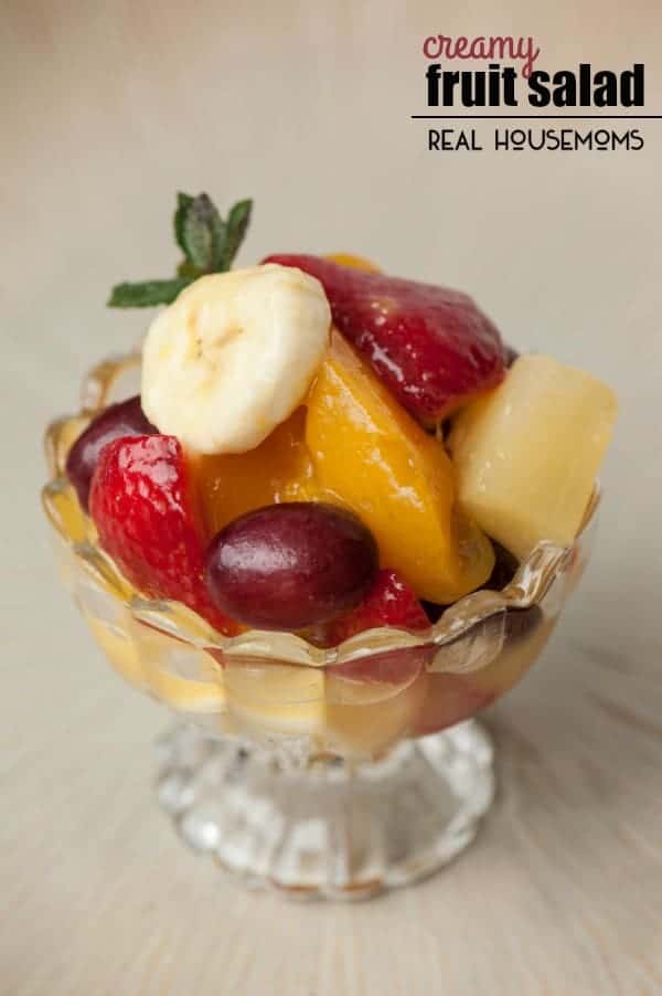 If you're looking for an easy side dish that can feed a crowd, you must make this CREAMY FRUIT SALAD made with instant vanilla pudding and a ton of fruit!