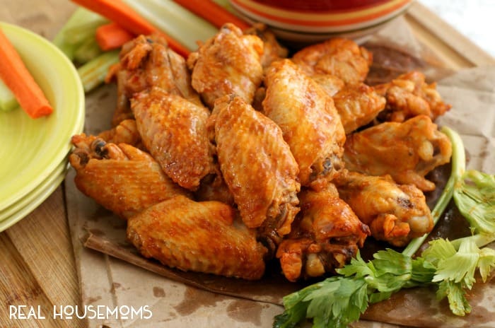 This CROCK POT CHICKEN WINGS RECIPE is the best way to get bold, spicy, fall-off-the-bone wings. You will never believe that they are cooked in a crock pot with just three ingredients!