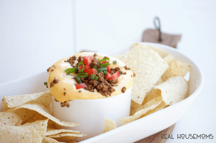 This GROUND BEEF TACO DIP is loaded with tons of tons of cheddar and spiced up ground beef. You won't be able to resist the cheesy goodness!