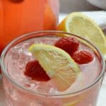 Toast to the warm summer months with this fun cocktail! HARD RASPBERRY LEMONADE is simple to make and great for serving a crowd of thirsty guests!