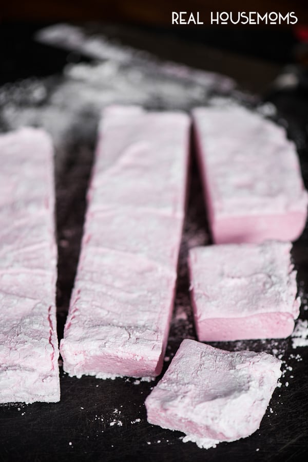 Homemade Raspberry Marshmallows covered in powdered sugar and sliced into strips