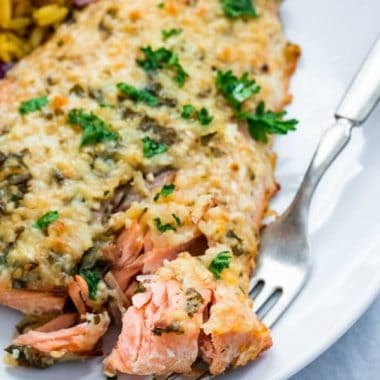 Easy 20-minute baked PARMESAN HERB SALMON with a savory parmesan cheese crust makes the perfect no-fuss weeknight meal!