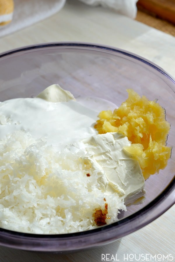 Welcome the warm summer months with this super easy and delicious PIÑA COLADA DESSERT DIP that's perfect for parties!