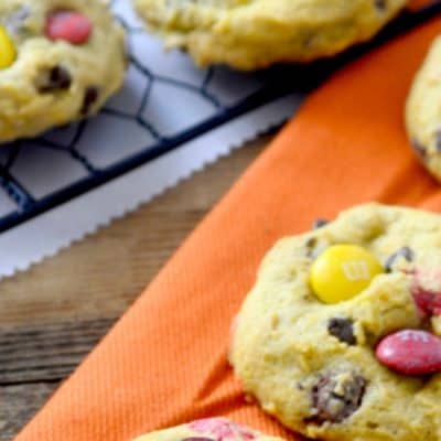 PUMPKIN M&M CHOCOLATE CHIP COOKIES are the perfect fall bite! Pumpkin spice and chocolate meld together into cookie bliss!