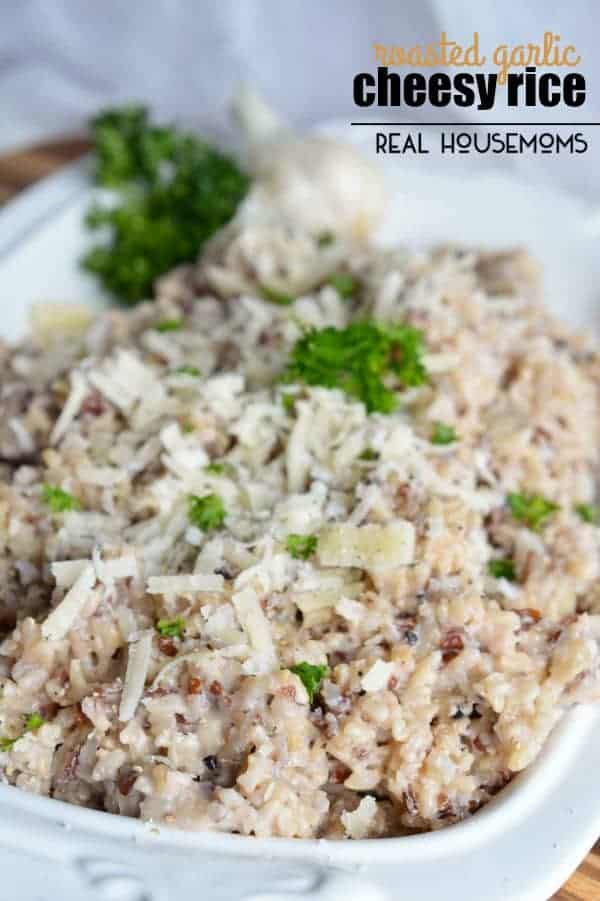 If you are looking for a side dish that is easy, filling, and bursting with flavor; this ROASTED GARLIC CHEESY RICE is what you need!