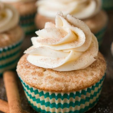Enjoy your favorite childhood cookie in cupcake form with these soft and fluffy cinnamon sugar Snickerdoodle Cupcakes!