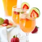 Strawberry & Lime Moscato Punch has the sweet flavor of your favorite wine with a great strawberry lime kick! This is an easy cocktail recipe, perfect for entertaining!